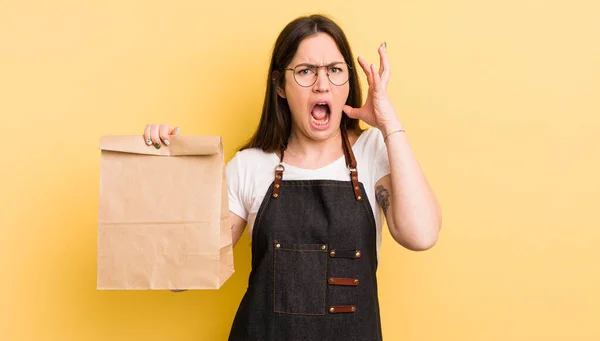 Young Pretty Woman Screaming Hands Air Fast Food Courier — Stockfoto