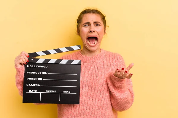 Young Pretty Woman Looking Desperate Frustrated Stressed Cinema Clapper Concept — Stock Photo, Image