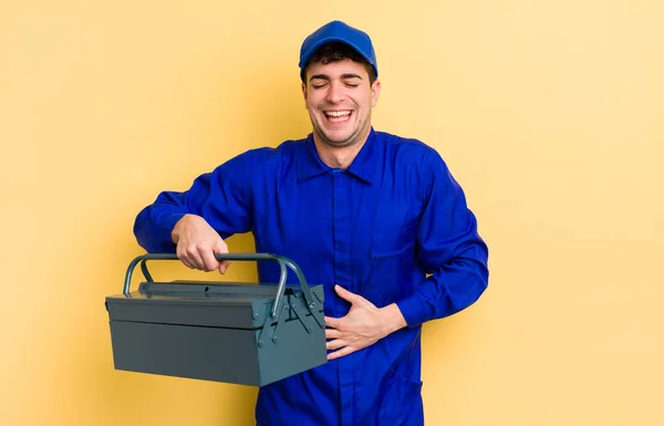 Young Handsome Man Laughing Out Loud Some Hilarious Joke Plumber — Stock Photo, Image