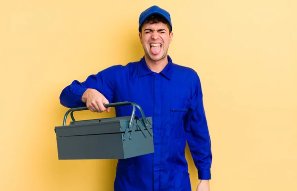 Young Handsome Man Cheerful Rebellious Attitude Joking Sticking Tongue Out — Stock Photo, Image