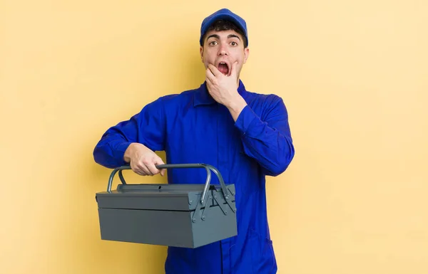 Young Handsome Man Mouth Eyes Wide Open Hand Chin Plumber — Stock Photo, Image