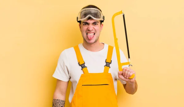 Young Handsome Man Feeling Disgusted Irritated Tongue Out Handyman Concept — Stock Photo, Image