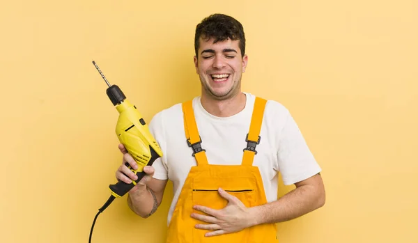Young Handsome Man Laughing Out Loud Some Hilarious Joke Handyman — Stock Photo, Image