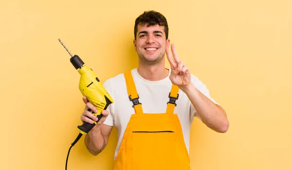 Young Handsome Man Smiling Looking Happy Gesturing Victory Peace Handyman — Stock Photo, Image