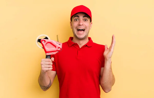 Young Handsome Man Feeling Happy Astonished Something Unbelievable Packer Concept — Stock Photo, Image