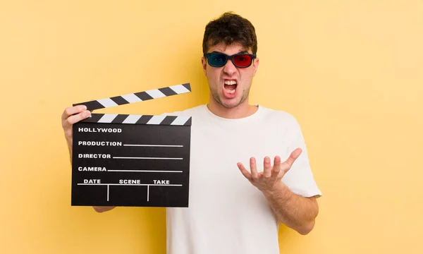 Young Handsome Man Looking Desperate Frustrated Stressed Cinema Clapper Concept — Stock Photo, Image