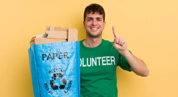 Young Handsome Man Smiling Looking Friendly Showing Number One — Stock Photo, Image