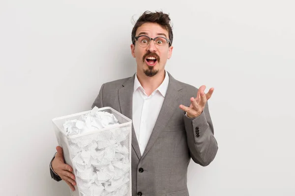 Young Handsome Man Amazed Shocked Astonished Unbelievable Surprise Paper Balls — Stock Photo, Image