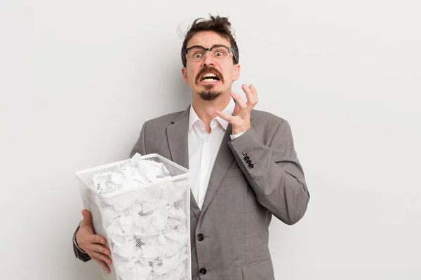 Young Handsome Man Looking Desperate Frustrated Stressed Paper Balls Basket — Stock Photo, Image