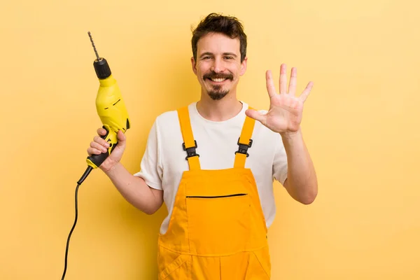 Smiling Looking Friendly Showing Number Five Handyman Drill Concept — Stock Photo, Image