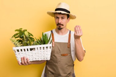 Capice ya da para hareketi yapan bir adam, sana ödemeni söylüyor. Bahçıvan konsepti