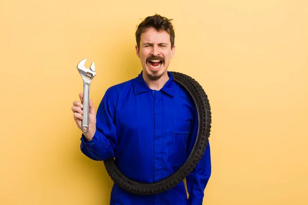 Man Shouting Aggressively Looking Very Angry Bike Repairman Concept — Stock Photo, Image