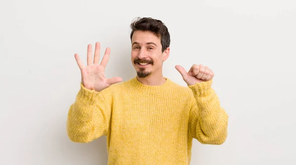 Hispanic Young Man Smiling Looking Friendly Showing Number Six Sixth — Stock Photo, Image