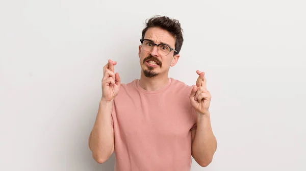 Hispanic Young Man Crossing Fingers Anxiously Hoping Good Luck Worried — Stock Photo, Image