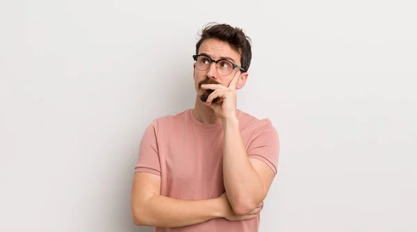 Hispanic Young Man Concentrated Look Wondering Doubtful Expression Looking Side — Stock Photo, Image