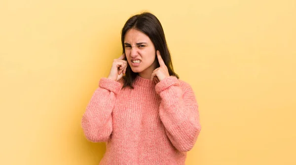 Young Hispanic Woman Looking Angry Stressed Annoyed Covering Both Ears — Stock Photo, Image