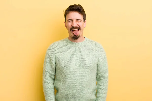 Young Hispanic Man Cheerful Carefree Rebellious Attitude Joking Sticking Tongue — Stock Photo, Image