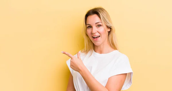 Blonde Caucasian Woman Looking Excited Surprised Pointing Side Upwards Copy — Stock Photo, Image