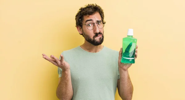 crazy man with a mouth wash bottle