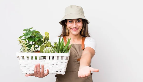 Pretty Hispanic Woman Smiling Happily Friendly Offering Showing Concept Plants — Stock Photo, Image
