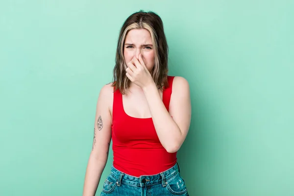 Pretty Caucasian Woman Feeling Disgusted Holding Nose Avoid Smelling Foul — Stock Fotó