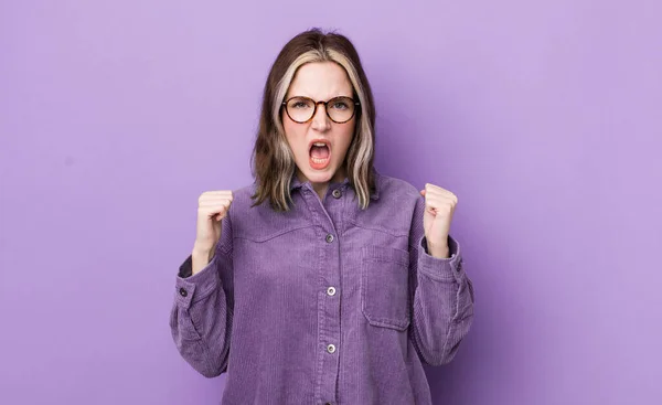 Pretty Caucasian Woman Shouting Aggressively Angry Expression Fists Clenched Celebrating — Stok fotoğraf