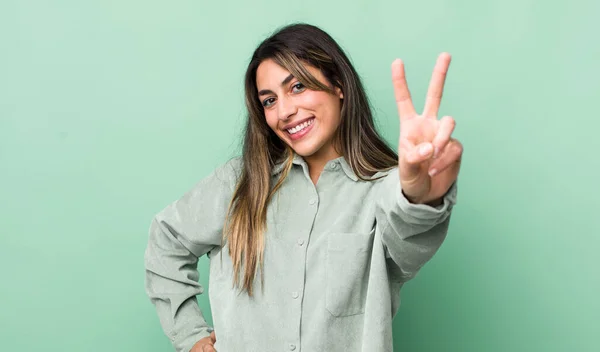 Pretty Hispanic Woman Smiling Looking Happy Carefree Positive Gesturing Victory — Stock Photo, Image