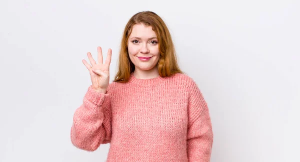 Pretty Red Head Woman Smiling Looking Friendly Showing Number Four — Stock Photo, Image
