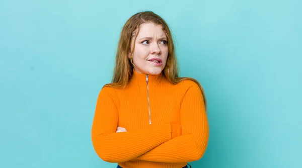 Pretty Red Head Woman Doubting Thinking Biting Lip Feeling Insecure — Stock Photo, Image