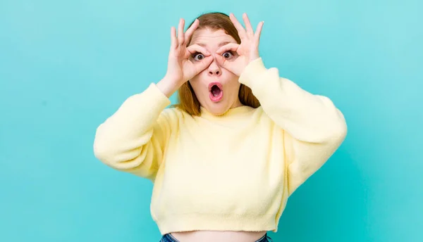 Pretty Red Head Woman Feeling Shocked Amazed Surprised Holding Glasses — Stock Photo, Image