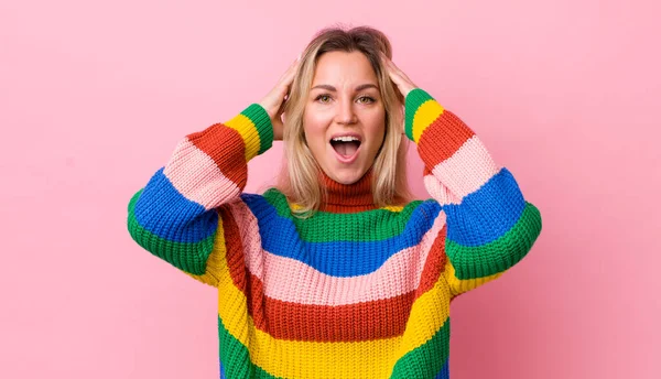 Pretty Blonde Woman Raising Hands Head Open Mouthed Feeling Extremely — Stock Photo, Image