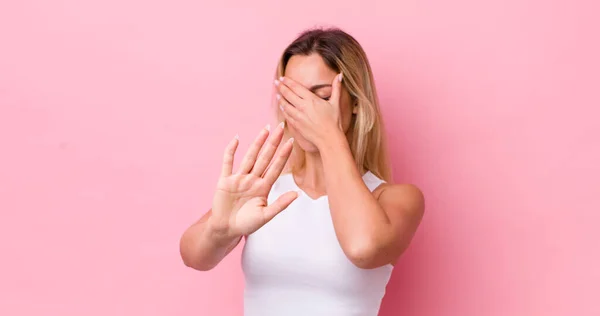 Pretty Blonde Woman Covering Face Hand Putting Other Hand Front — Stock Photo, Image