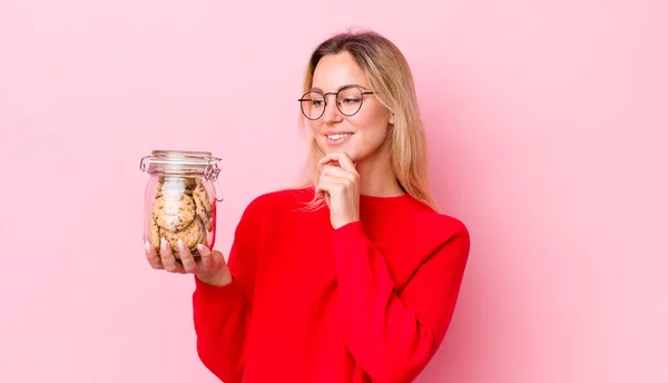 Blonde Pretty Woman Smiling Happy Confident Expression Hand Chin Cookies — Stockfoto