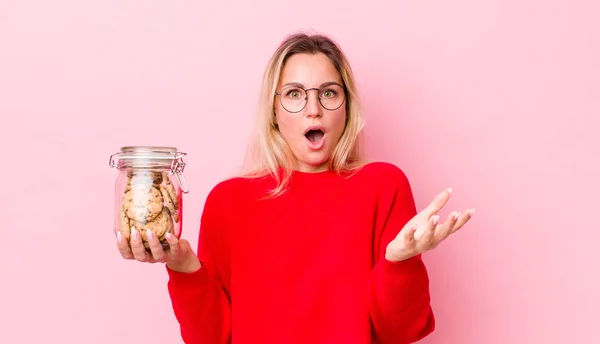 Blonde Pretty Woman Feeling Extremely Shocked Surprised Cookies Concept — Stockfoto