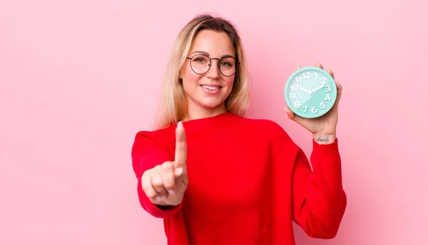 Blonde Pretty Woman Smiling Proudly Confidently Making Number One Alarm — Stock Photo, Image