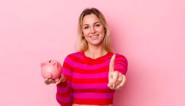 Blonde Pretty Woman Smiling Proudly Confidently Making Number One Piggy — Stockfoto