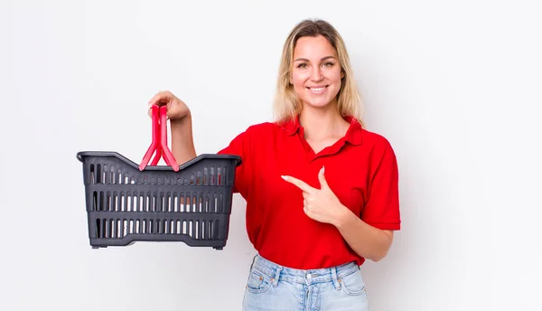Blonde Pretty Woman Smiling Cheerfully Feeling Happy Pointing Side Shopping — Stock Photo, Image