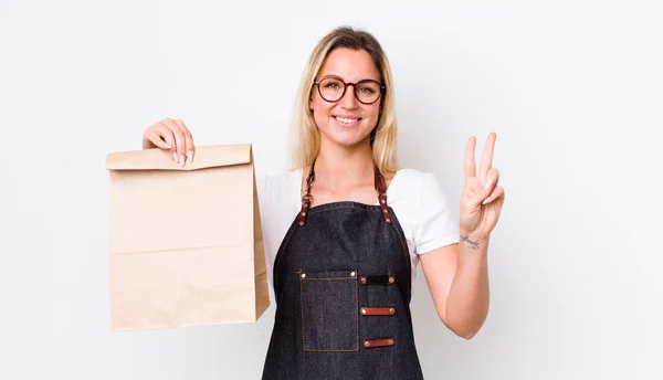 Blonde Pretty Woman Smiling Looking Friendly Showing Number Two Delivery — Stock Photo, Image
