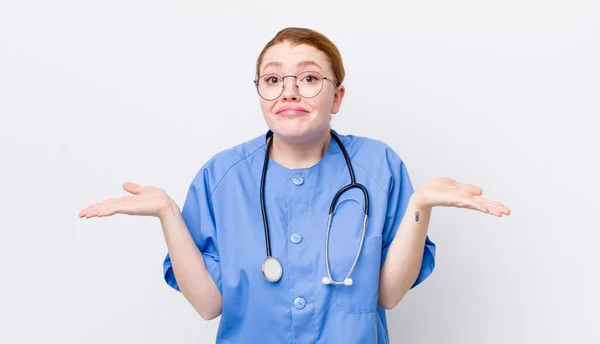 Red Head Pretty Woman Feeling Puzzled Confused Doubting Nurse Concept — Stock Photo, Image