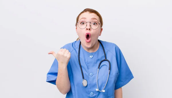 Red Head Pretty Woman Looking Astonished Disbelief Nurse Concept — Stock Photo, Image