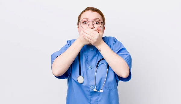 Red Head Pretty Woman Covering Mouth Hands Shocked Nurse Concept — Stock Photo, Image