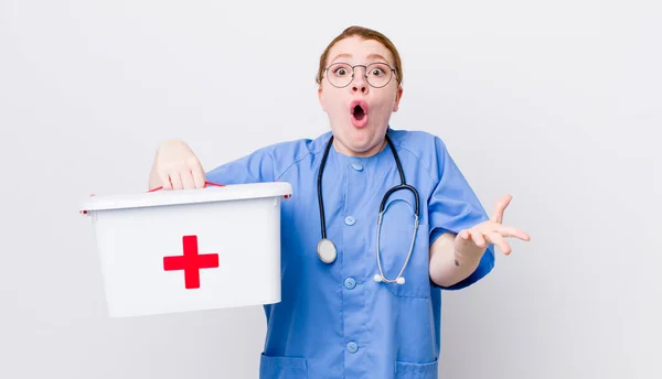 Red Head Pretty Woman Feeling Extremely Shocked Surprised Nurse Concept — Stock Photo, Image