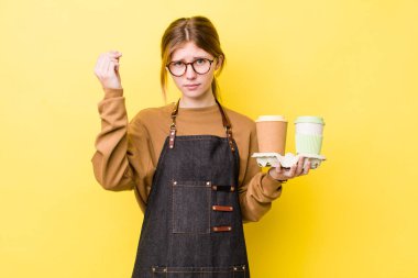 Kızıl saçlı, güzel bir kadın kapiş ya da para hareketi yapıyor, sana ödemeni söylüyor. kahve konseptini kaldır.