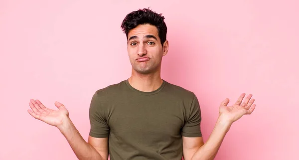 Handsome Hispanic Man Feeling Puzzled Confused Doubting Weighting Choosing Different — Stock Photo, Image