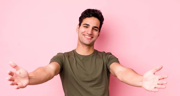 Handsome Hispanic Man Smiling Cheerfully Giving Warm Friendly Loving Welcome — Stock Photo, Image