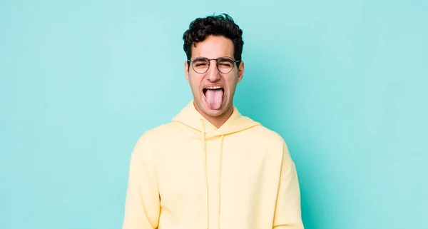 Handsome Hispanic Man Cheerful Carefree Rebellious Attitude Joking Sticking Tongue — Stock Photo, Image