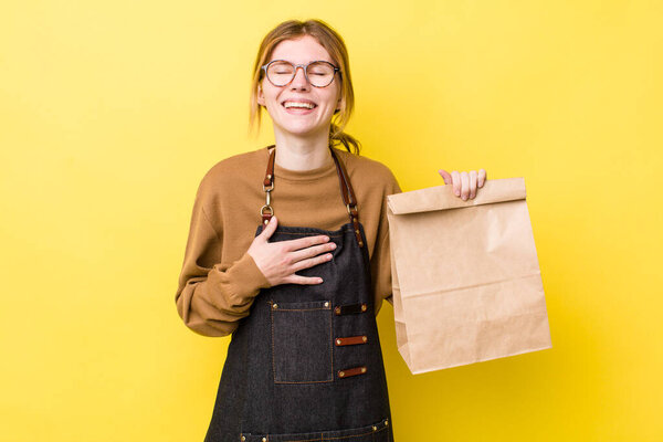 red head pretty woman laughing out loud at some hilarious joke. delivery take away concept