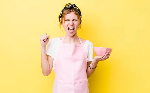 Red Head Pretty Woman Shouting Aggressively Angry Expression Housewife Holding — Stockfoto