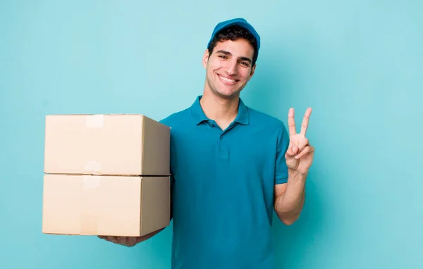 Handsome Hispanic Man Smiling Looking Friendly Showing Number Two Employee — Stock Photo, Image