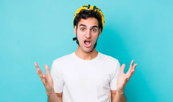 Handsome Hispanic Man Feeling Extremely Shocked Surprised Bike Concept — Stock Photo, Image